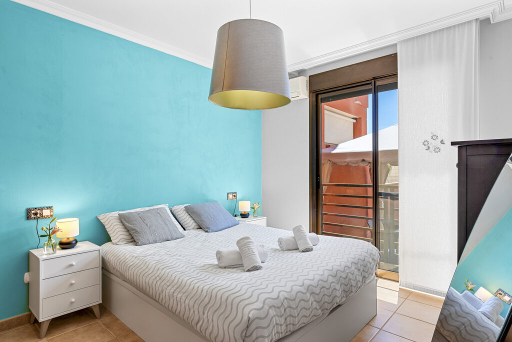 Flamboyant Sus Apartment · Jardín y piscina en La Tejita – 3