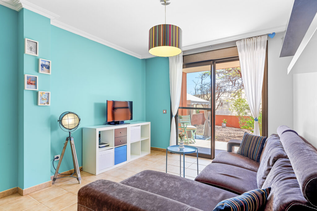 Flamboyant Sus Apartment · Jardín y piscina en La Tejita – 4