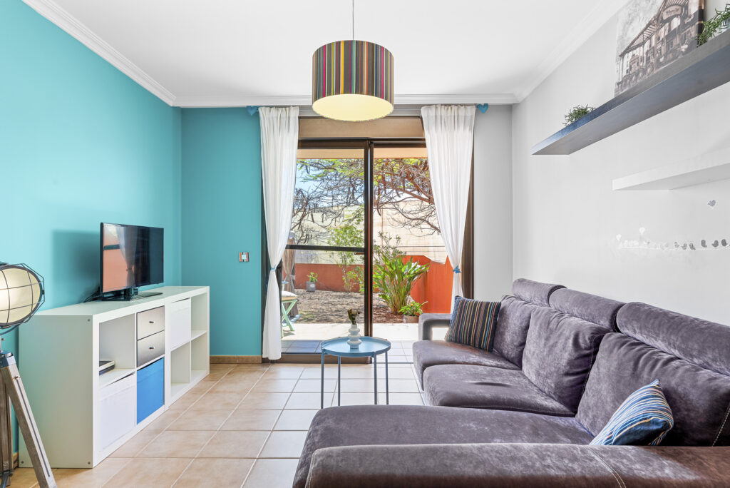 Flamboyant Sus Apartment · Jardín y piscina en La Tejita – 7