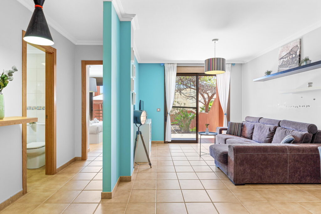 Flamboyant Sus Apartment · Jardín y piscina en La Tejita – 24